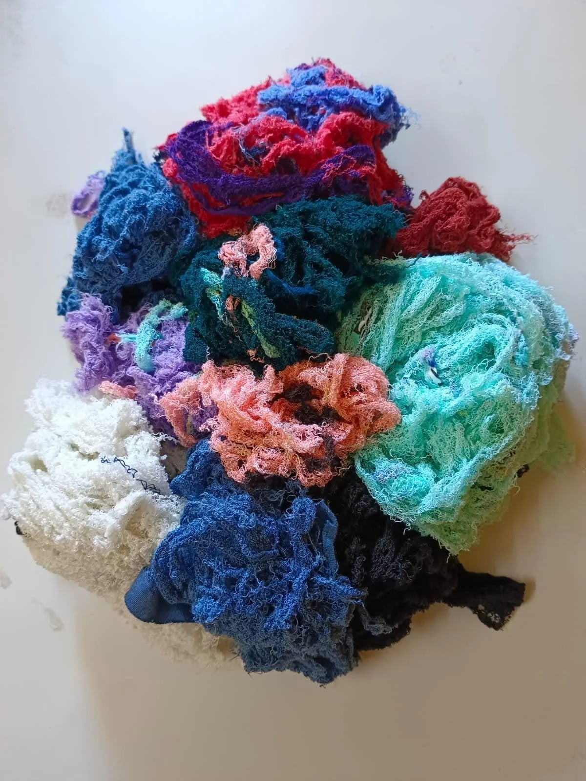 Colourful cotton yarn waste supplied by Threads Culturing Traders